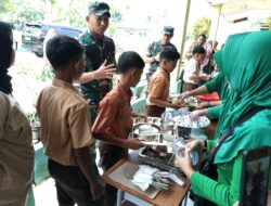 Bersinergi TNI – Polri Bagikan Program Makan Siang Gratis Anak- Anak SD