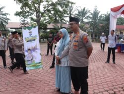 Kapolres Langkat Serahkan 12 Ekor Sapi dan 5 Ekor Kambing Hewan Kurban di Momen Idul Adha 1446 H