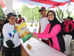 Polres Langkat melaksanakan Gerakan Pangan Murah Penjualan Beras Stabilisasi Pasokan dan Harga Pangan (SPHP).