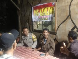 Bhabinkamtibmas Polsek Besitang Jalin Dialog dan Cek Pos Kamling di Desa Bukit Mas