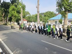 Satlantas Polres Langkat Melaksanakan Pengawalan dan Pengaturan Giat Gerak Jalan Dalam Rangka ospek Mahasiswa baru Akper pal