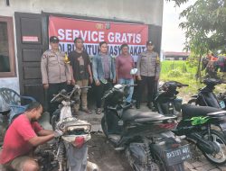 Jajaran Polresta Deli Serdang buka bengkel Service gratis untuk sepeda motor warga yang terendam banjir