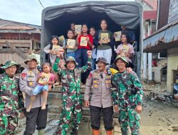 “Susu dari Presiden, Senyum Anak-anak di Pasar Huta Godang – Brimob Polda Sumut Hadir Tebar Kepedulian”
