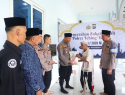 Polres Tebing Tinggi Salurkan Zakat Fitrah kepada Masyarakat