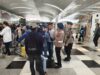 Polresta Deli Serdang Pantau Keamanan dan Berikan Pelayanan Kesehatan Kepada Penumpang Terdampak Pembatalan Penerbangan di Bandara Kualanamu