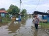 Debit Air Naik hingga 50 Sentimeter, Polsek Tanjung Pura Gerak Cepat Pantau Warga Terdampak Banjir