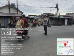 Pengaturan Lalu-lintas pagi hari memberikan pelayanan kepada anak-anak Sekolah dan masyarakat Pengguna Jalan.