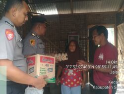 Bentuk Kepedulian, Polsek Sipispis Berikan Bansos kepada Masyarakat Kurang Mampu